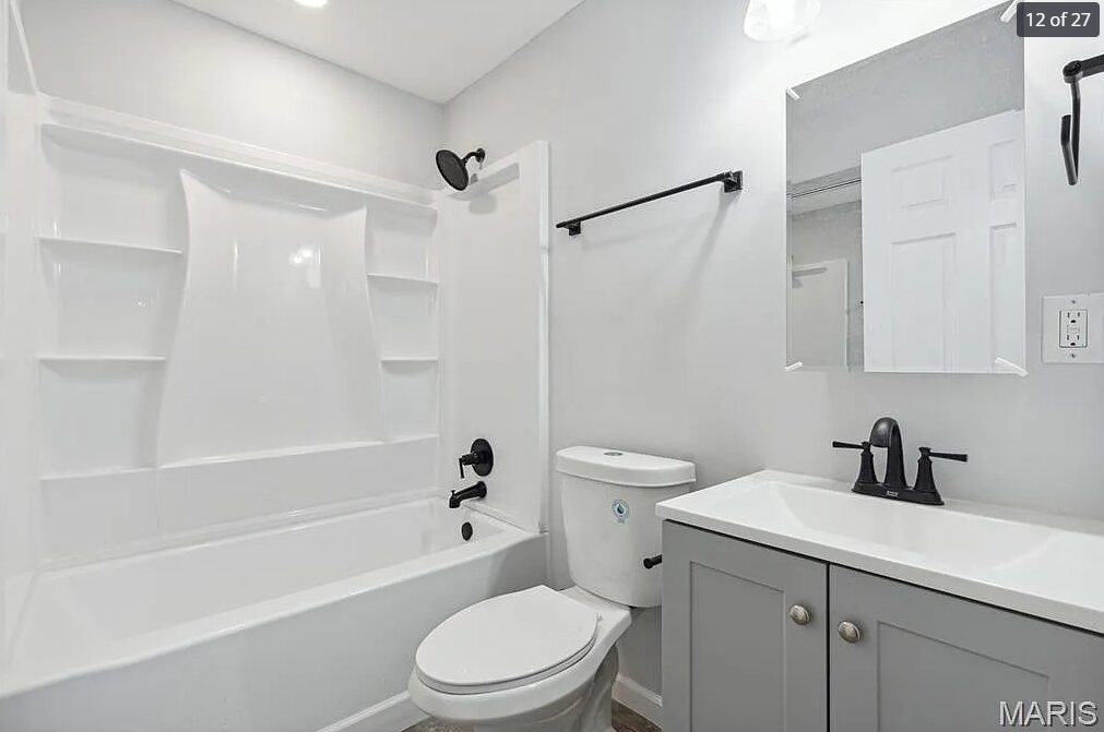 Finished bathroom with black fixtures