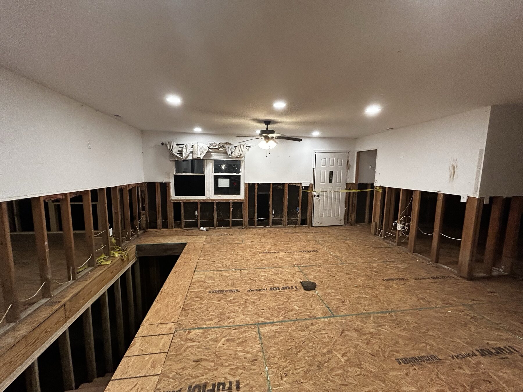 Interior opened for flood recovery and wall reconfiguration