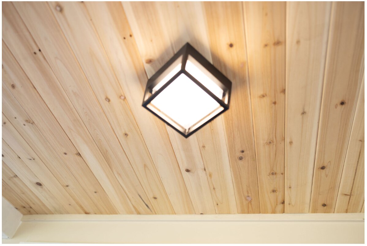 Natural wood ceiling at the covered entrance